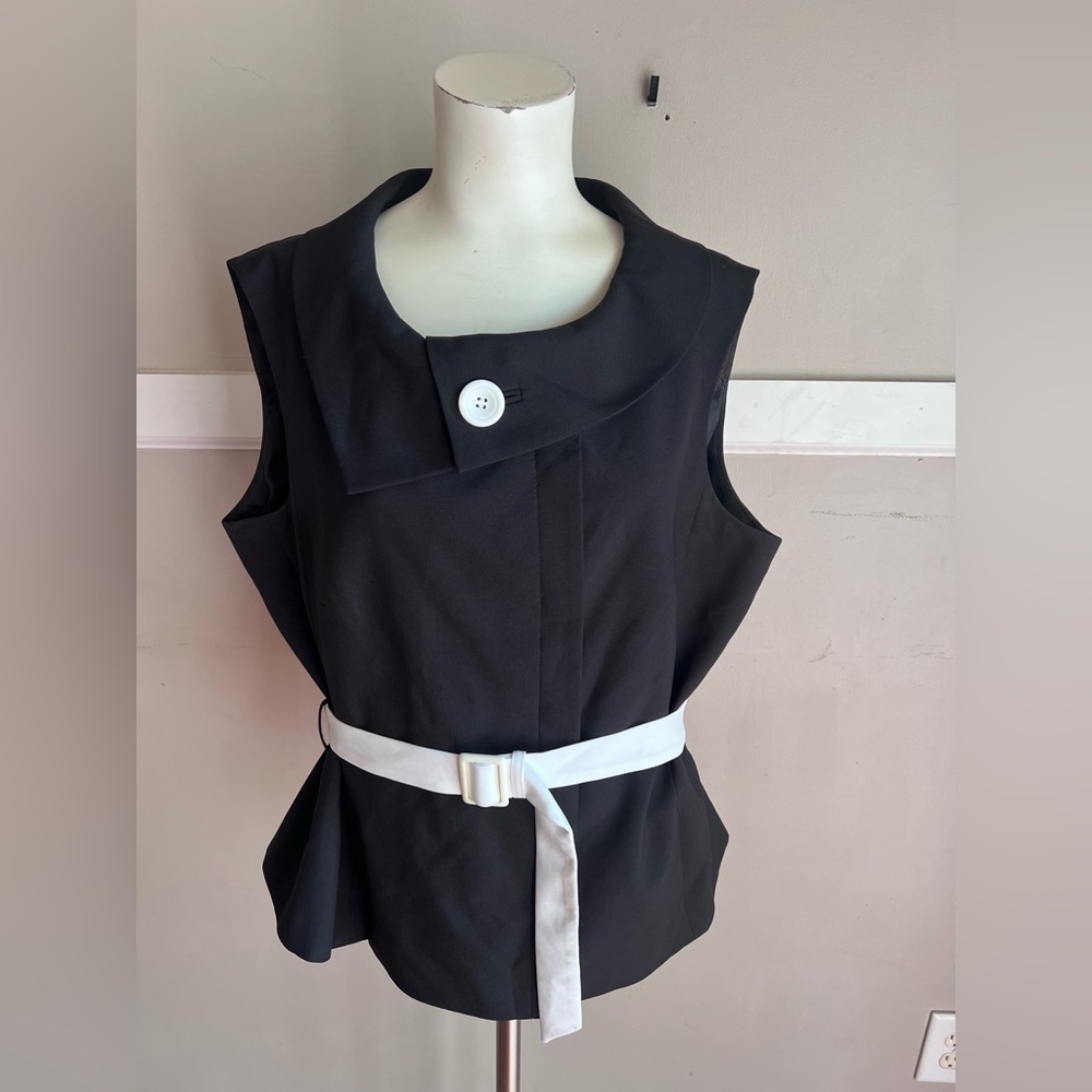 Sleeveless Black Tunic with Signature Asymmetrical Collar and White Waist Belt